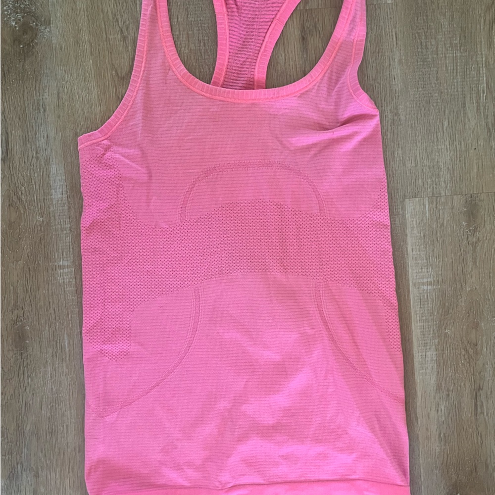Pink lululemon swiftly tech tank top size 4